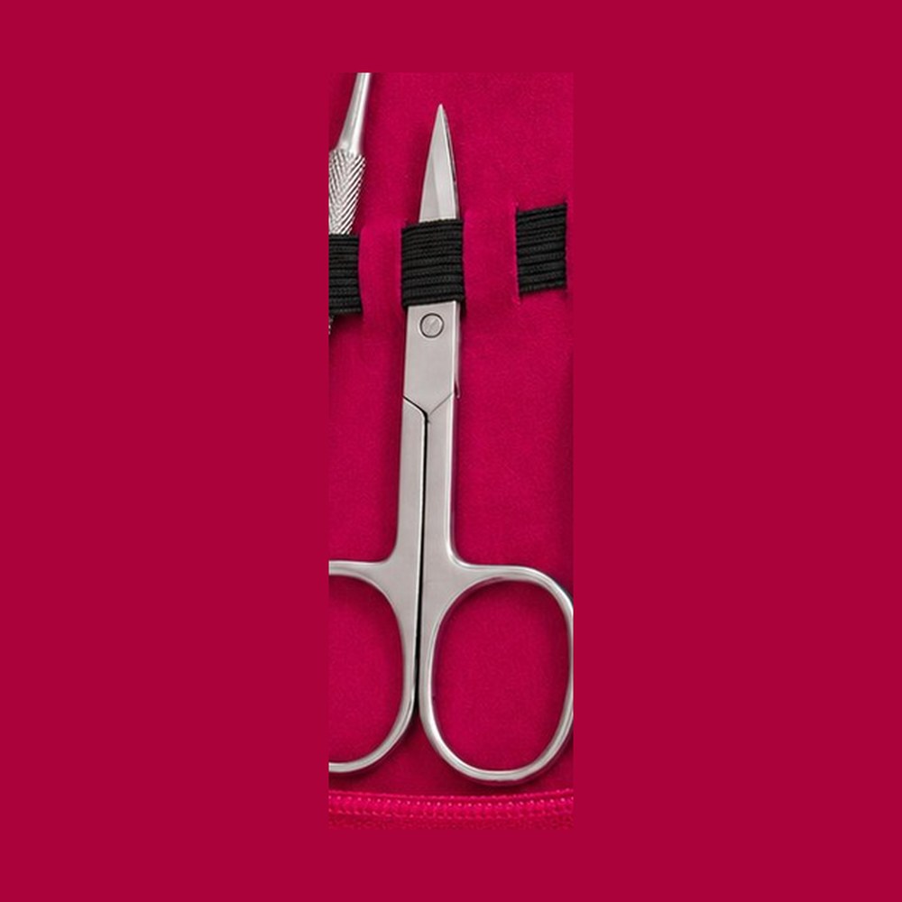 Cuticle scissors held in the case